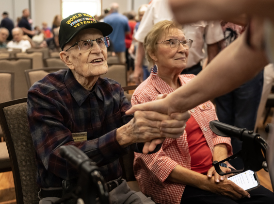 World War II Air Force veteran Ralph May, who will be 99 in two weeks, shakes the hand of an admirer during the Memorial Day ceremony held in Sun City on Monday, May 25, 2026. Photo by Andy Sharp.