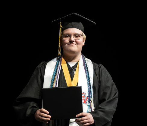 Richarte High School salutatorian Kendal Tipton smiles after receiving his diploma during the Richarte High Class of 2026 Commencement held at the Rodney and Mary Klett Performing Art Center on Thursday, May 21, 2026.