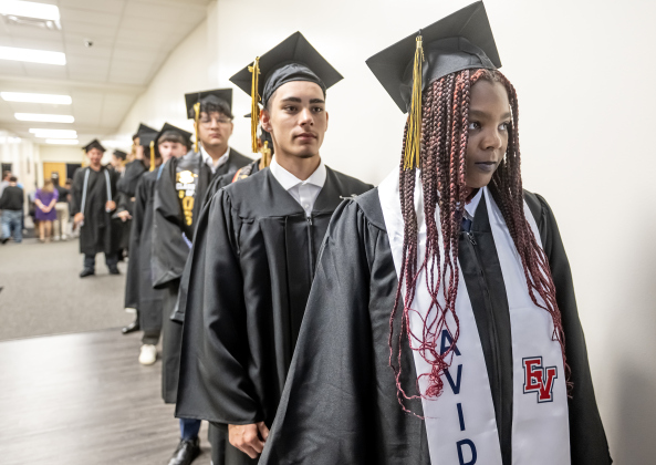 Richarte High graduates Chloe Hill, front right, and Korbyn Herring prepare to walk onstage with fellow classmates  during the Richarte High School  Class of 2026 Commencement held at the Rodney and Mary Klett Performing Art Center on Thursday, May 21, 2026.