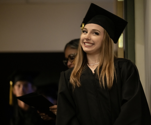 Richarte senior Lilly Hoer wears a big smile while looking into the audience at her father, Russ Burleson  just before receiving her diploma during the Richarte High Class of 2026 Commencement held at the Rodney an Mary Klett Performing Art Center on Thursday, May 21, 2026.