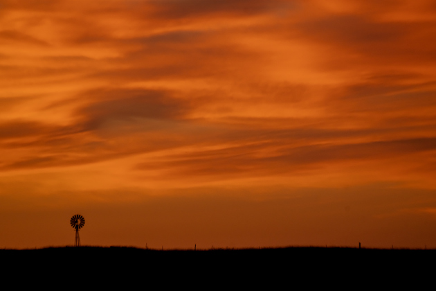 The skies fill with vibrant color a few minutes past sunset  in this view from County Road 420 in Thrall on Wednesday, May 27, 2026.  Photo by Andy Sharp. 