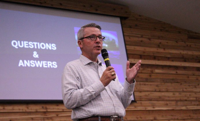 State Representative Brad Buckley, R-Salado, of District 54, who voted in favor of the bill that pushed the use of better electricity in the state, speaks against the transmission lines during a Q&amp;A portion of the meeting. Photo by Nalani Nuylan.