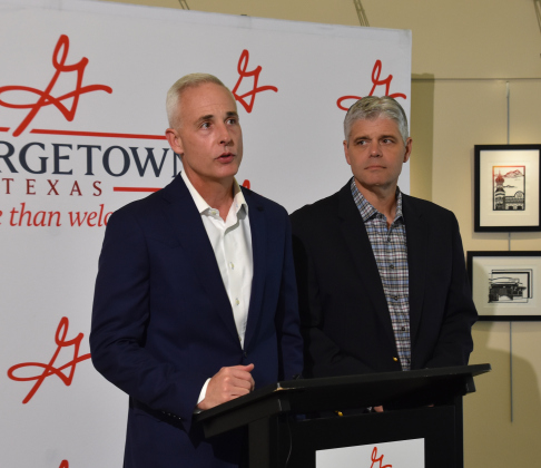 Georgetown Mayor Josh Schroeder, left, and City Manager David Morgan, spoke at a press conference at Georgetown City Hall on May 13 about the approval of the term sheet and pursuit of a contract with Recharge Water LP. (Photo by Kaitlyn Wilkes)