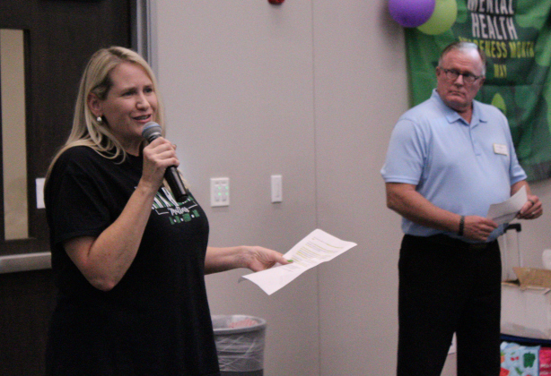 Evelyn McLean, Justice of the Peace for Precinct 3 in Williamson County (left), welcomes everyone in attendance to the 6th annual Mental Health and Wellness Expo, May 27 at the Georgetown Annex. Photo by Nalani Nuylan.