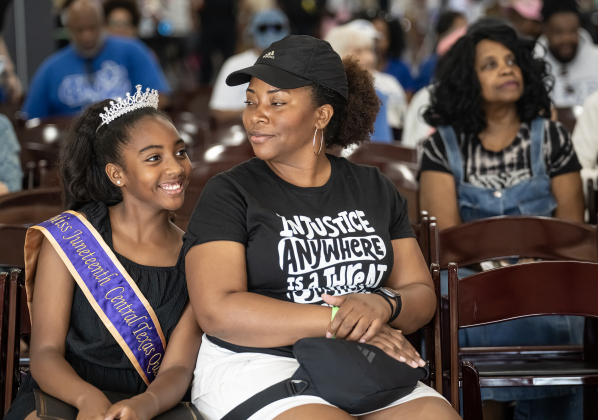 Rylie Thomas, 11, the Junior Miss Juneteenth of Central Texas sits next to her mom Johanna Thomas during the 74th Annual Juneteenth  Celebration held at the Georgetown Community Center on Saturday, June 13, 2026.  The event is hosted by the Georgetown Cultural Citizen Memorial Association.    Photo by Andy Sharp.