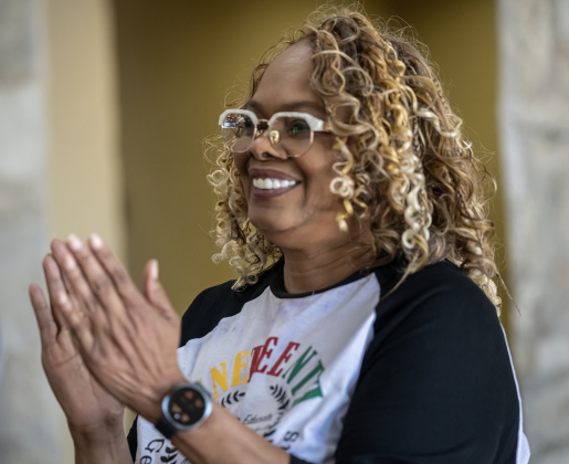 Regina Durden, President of GCCMA, claps during a presentation at  the 74th Annual Juneteenth  Celebration held at the Georgetown Community Center on Saturday, June 13, 2026.  The event is hosted by the Georgetown Cultural Citizen Memorial Association.    Photo by Andy Sharp.
