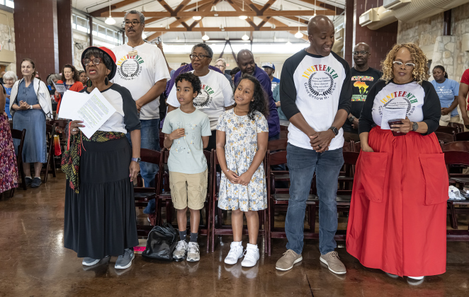 (From left to right in front row) Paulette Taylor, her grandson Daz, 10, her granddaughter Destiny, 9, Taylor’s son Dyron Taylor and G.C.C.M.A. President Regina Durden join in the singing of the Negro National Anthem during   the 74th Annual Juneteenth  Celebration held at the Georgetown Community Center on Saturday, June 13, 2026.  The event is hosted by the Georgetown Cultural Citizen Memorial Association.    Photo by Andy Sharp.