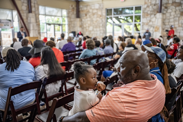 Jerome Curry holds his granddaughter  Zariyah, 4,  during the 74th Annual Juneteenth  Celebration held at the Georgetown Community Center on Saturday, June 13, 2026.  The event is hosted by the Georgetown Cultural Citizen Memorial Association.    Photo by Andy Sharp.