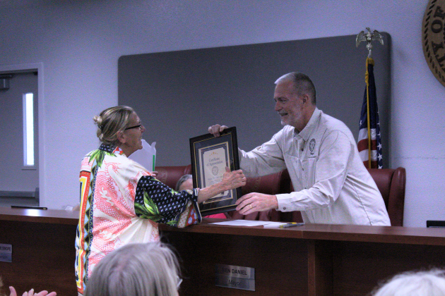 Mayor Daniel presents Mary Condon with a Certificate of Appreciation for her 32 years of public service. She was later appointed to serve one term as Mayor Pro Tem during the meeting. Photo by Nalani Nuylan.
