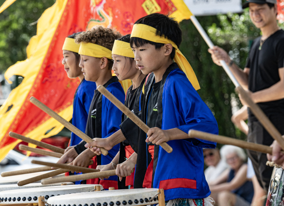 Members of the Summit Dragon &amp; Lion Dance Team perform in the Light and Waterworks District area on Saturday,  May 30, 2026.  The free program was offered by the Georgetown Public Library.   Photo by Andy Sharp.