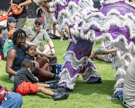 Members of the Summit Dragon &amp; Lion Dance Team perform in the Light and Waterworks District area on Saturday,  May 30, 2026.  The free program was offered by the Georgetown Public Library.   Photo by Andy Sharp.