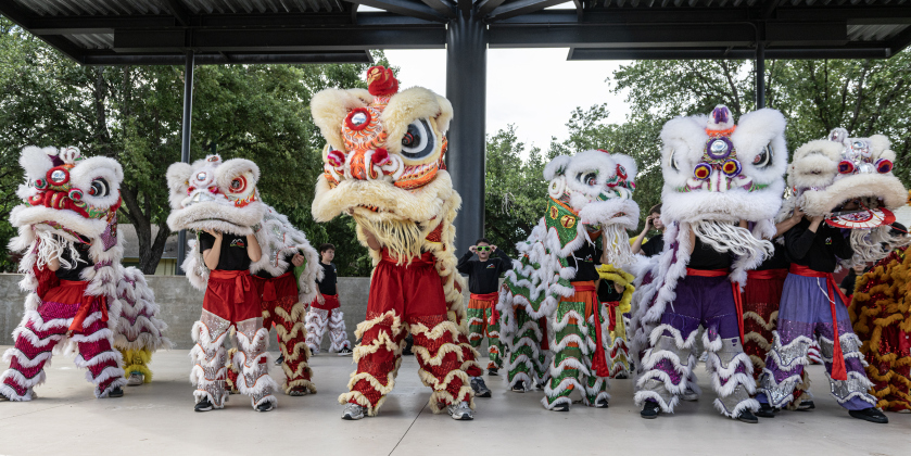 Members of the Summit Dragon &amp; Lion Dance Team perform in the Light and Waterworks District area on Saturday, May 30. Photo by Andy Sharp
