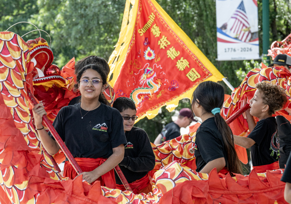 Members of the Summit Dragon &amp; Lion Dance Team perform in the Light and Waterworks District area on Saturday,  May 30, 2026.  The free program was offered by the Georgetown Public Library.   Photo by Andy Sharp.