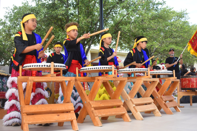 Members of the Summit Dragon &amp; Lion Dance Team perform in the Light and Waterworks District area on Saturday,  May 30, 2026.  The free program was offered by the Georgetown Public Library.   Photo by Katherine Hamilton
