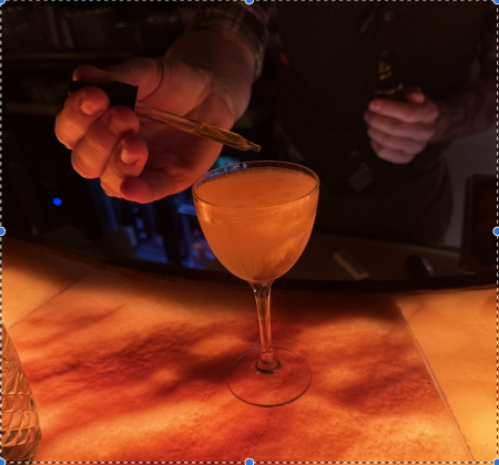 Patrick Nikel making the finishing touches on his award winning The Royal Tea cocktail— available at Brass Peacock. Photo by Abbey Archer