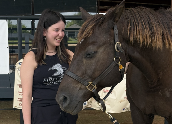 Chloe Harlow runs Chloe’s Pet Corral and raises money for animal nonprofits, including the Ride on Center for Kids. (Photo courtesy of ROCK)