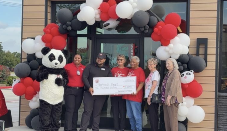 A new Panda Express location opened in Taylor. The company presented a $1,000 check to local organization Shepherd's Heart. (From left to right) Panda Express Area Coach of Operations Gwen Werde, General Manager Yunior Torres standing with Sue Messick, Dianne Thomas, Cheryl Cornelias, Loretta Masters. 