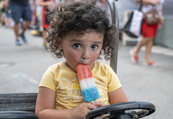 2-year-old Elliott Malz enjoys an icy treat on a warm morning during Market Days on Saturday, July 11, 2026.  Market Days  is held on the second Saturday  of the month in downtown Georgetown.   Photo by Andy Sharp