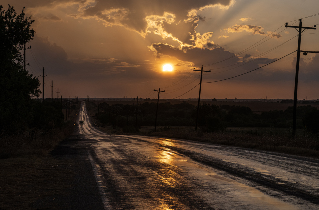 F.M. 972 east of Walburg was adorned with moisture  on Sunday, July 12, 2026 as rain moved into Williamson County.   This was near sunset.  Photo by Andy Sharp