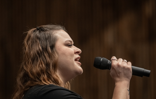 Lexi Wood sang “The Star-Spangled Banner” during the Grand Opening of the Williamson County Administration Building  on Tuesday, July 14, 2026.  A County Showcase was held in addition to a ribbon cutting ceremony in the County Commissioners Courtroom.   Photo by Andy Sharp