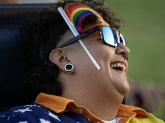 Miranda Salazar enjoyed music performed by the Wild Heaven Band during the 6th Annual Taylor Pride Festival, held at Heritage Square Park on Saturday evening, June 27, 2026.     Photo by Andy Sharp