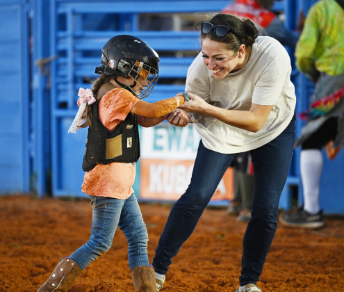 5-year-old Julia Hegarty is congratulated by her mom Arianna Hegarty after Julia’s Mutton Bustin’ ride at the 82nd Annual Williamson County Sheriff’s Posse Rodeo on Friday, June 26, 2026. The rodeo continued through Saturday night.    Photo by Andy Sharp