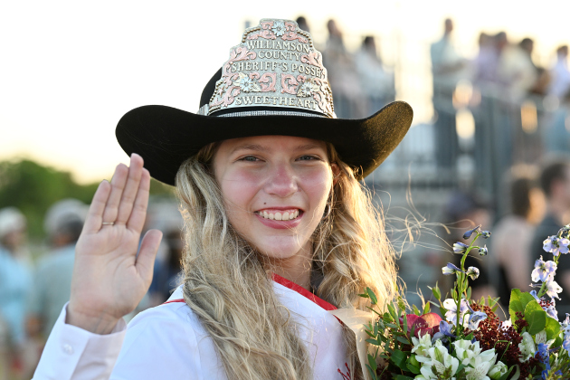 2026 Rodeo Sweetheart Aleena Isham, 17, waves during the 82nd Annual Williamson County Sheriff’s Posse Rodeo on Friday, June 26, 2026. The rodeo continued through Saturday night.    Photo by Andy Sharp