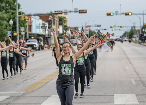 Members of the Taylor ISD Hi-Steppers Dance Troupe  march along Main Street as they participate in Taylor’s Juneteenth celebration on Saturday, June 20, 2026.    Photo by Andy Sharp