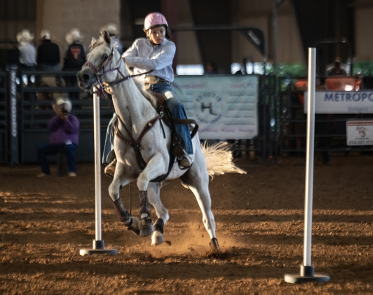 Jordyn Manuel competes in 15-U poles  during the 3rd Annual Bill Pickett Youth Rodeo, held at the Williamson County Expo Center on Saturday, June 20, 2026.  Contestants can be no older than 18 to participate.     Photo by Andy Sharp