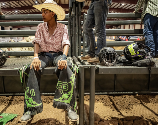 17-year-old Jacki Gayle of Odessa, Texas, who competes in bull riding, waits for her turn in the competition arena  during the 3rd Annual Bill Pickett Youth Rodeo, held at the Williamson County Expo Center on Saturday, June 20, 2026.  Contestants can be no older than 18 to participate.     Photo by Andy Sharp