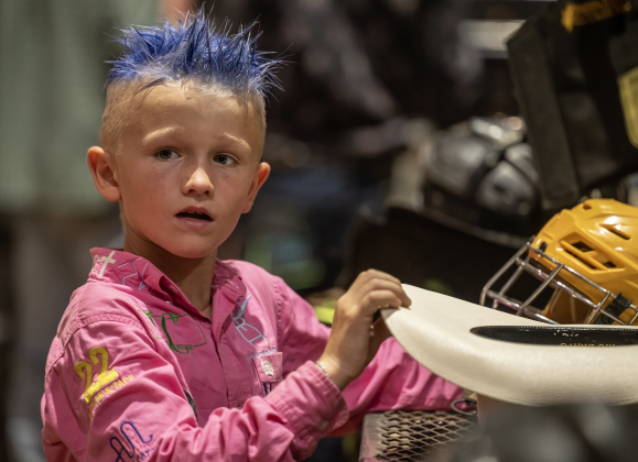 8-year-old Klaxon Robertson, a saddle bronc rider from Jacksonville, Texas, sported a colorful hairstyle  during the 3rd Annual Bill Pickett Youth Rodeo, held at the Williamson County Expo Center on Saturday, June 20, 2026.  Contestants can be no older than 18 to participate.     Photo by Andy Sharp