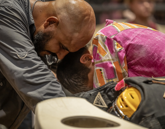 A father and son pray before competition during the 3rd Annual Bill Pickett Youth Rodeo, held at the Williamson County Expo Center on Saturday, June 20, 2026.  Contestants can be no older than 18 to participate.     Photo by Andy Sharp