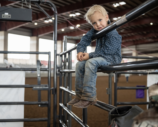 Brodee Nalley, 4, from Rochelle, Texas, relaxes before competing in Mutton Bustin’  during the 3rd Annual Bill Pickett Youth Rodeo, held at the Williamson County Expo Center on Saturday, June 20, 2026.  Contestants can be no older than 18 to participate.     Photo by Andy Sharp