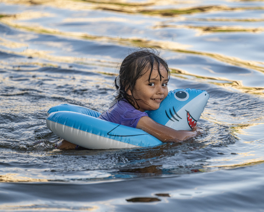 4-year-old Alison Santes enjoyed the cool waters of the San Gabriel River near San Gabriel Park on Monday, June 22, 2026, the first day of summer.  Temperatures reached into the mid-upper 90s on this day.    Photo by Andy Sharp
