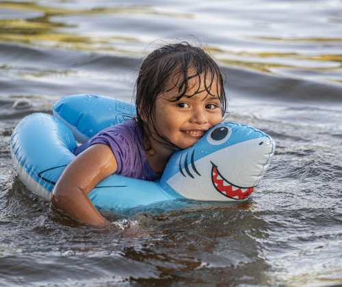 4-year-old Alison Santes enjoyed the cool waters of the San Gabriel River near San Gabriel Park on Monday, June 22, 2026, the first day of summer.  Temperatures reached into the mid-upper 90s on this day.    Photo by Andy Sharp