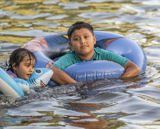 4-year-old Alison Santes  and her cousin Hank Rodriguez, 9, enjoyed the cool waters of the San Gabriel River near San Gabriel Park on Monday, June 22, 2026, the first day of summer.  Temperatures reached into the mid-upper 90s on this day.    Photo by Andy Sharp