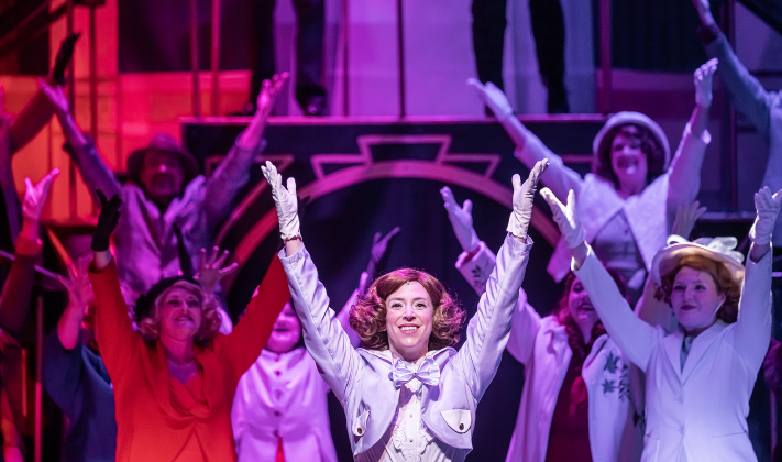 Antonette Knoedl, center, as Peggy Sawyer, is  shown in a photo from the dress rehearsal of the Georgetown Palace production of “42nd Street”  on Thursday, July 23, 2026. The show runs through August 30 on the Springer Stage.   Photo by Andy Sharp