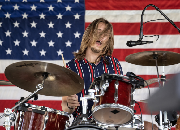 Dylan Becker, drummer with the group Aviator, performs during the Sertoma Club 4th of July celebration in San Gabriel Park  on Saturday, July 4, 2026.   Photo by Andy Sharp