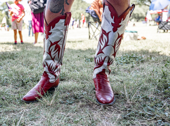 Ali Simmel wore the boots that once belonged to her great-grandmother during the Sertoma Club 4th of July celebration in San Gabriel Park on Saturday, July 4, 2026.   Photo by Andy Sharp