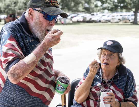 Paul and Kay Hindelang cool off with an icy treat  during the Sertoma Club 4th of July celebration in San Gabriel Park  on Saturday, July 4, 2026.   Photo by Andy Sharp