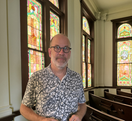 Architect Doug Moss stands inside the former First Presbyterian Church in Taylor, which is being transformed into commercial space for restaurants.   Photo by Abbey Archer