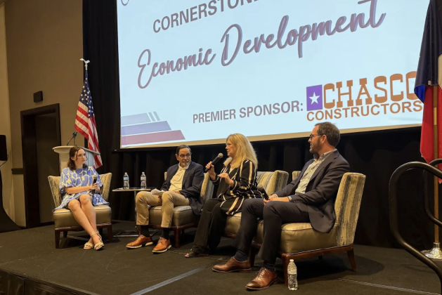From left, Kaitlyn Wilkes, the city reporter for the Sun, Dave Porter the Executive Director of Williamson County’s Economic Development Partnership, Janie Havel the North and Central Texas Regional Representative for Governor Abbott, and Cameron Goodman the Economic Development Director of Georgetown. Photo by Abbey Archer