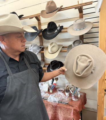 Mr. Funmaker manipulated the crown of a cowboy hat to resemble the head of a steer.