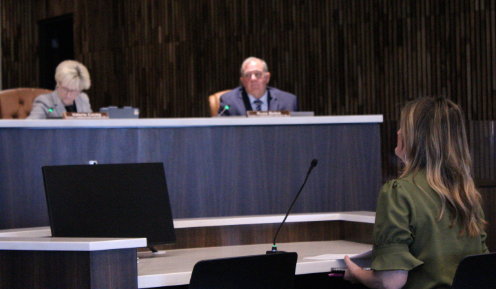 Sally Bardwell, Williamson County’s Housing and Urban Development Grant coordinator (front), presents the 2026 Action plan during the August 4 Commissioners Court meeting. Photo by Nalani Nuylan.