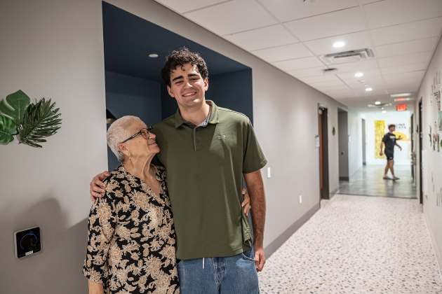 Sol Arce, left, hugs her freshman  grandson Jonas Aguiar of San Antonio  as he moves into Jessie Daniel Ames Hall on Saturday, August 15, 2026 during freshmen move-in day at Southwestern University.   Jessie Daniel Ames Hall opened to students in January.  The approximately 1400 students will begin their classes on August 24th.   Photo by Andy Sharp