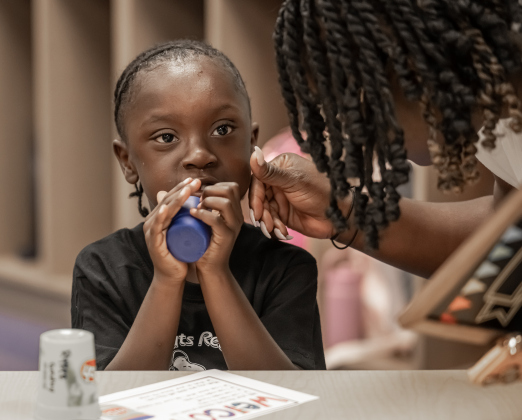 Mom Amilia Pierre spends time with her kindergartener son Ronald Pierre Jr., who turns 5 on Sunday, before saying goodbye for the day on Wednesday, August 19, 2026,  the first day of classes at George Washington Carver Elementary School.