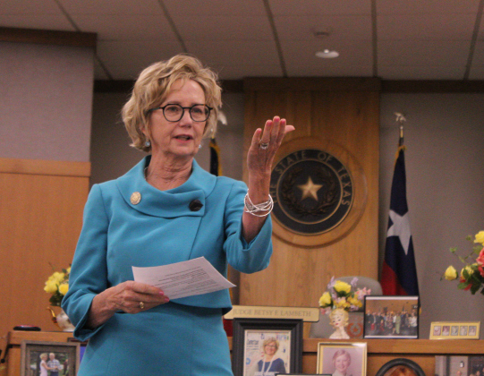 Honorable Judge Betsy Figer Lambeth of the 425th District Court gives a speech at her retirement ceremony in the 277th District Courtroom on August 21. She has served for about 14 years as a judge. Photo by Nalani Nuylan.