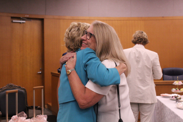 Judge Lambeth laughs at a joke Georgetown City Council Member Ron Garland said during the reception of her retirement celebration. Photo by Nalani Nuylan.