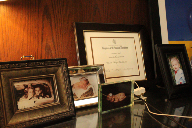 Photos of Judge Lambeth’s family decorate her office. One of her granddaughters, Roselie is pictured and told Judge Lambeth she wants to be like her and wants to be the first woman to do something. Photo by Nalani Nuylan.