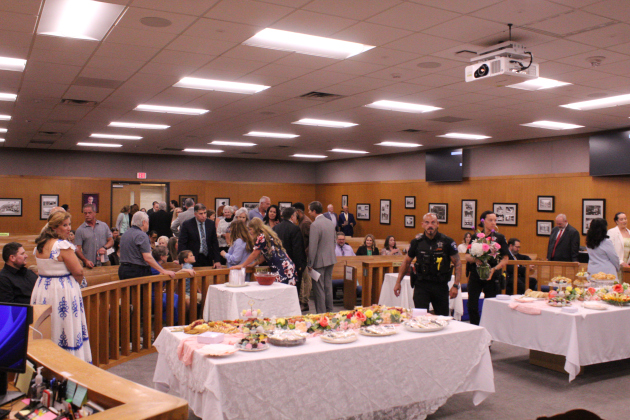 The 277th District Courtroom in Williamson County’s Justice Center is filled with friends and colleagues to celebrate Judge Lambeth’s retirement on August 21. Photo by Nalani Nuylan.